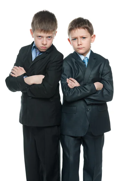 Serious yong boys on the white background — Stock Photo, Image