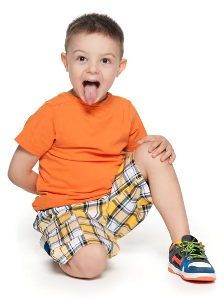 Retrato de un chico con la lengua colgando —  Fotos de Stock