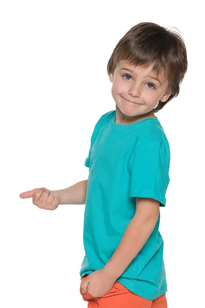 Sonriente niño sostiene su pulgar hacia arriba y hacia atrás —  Fotos de Stock