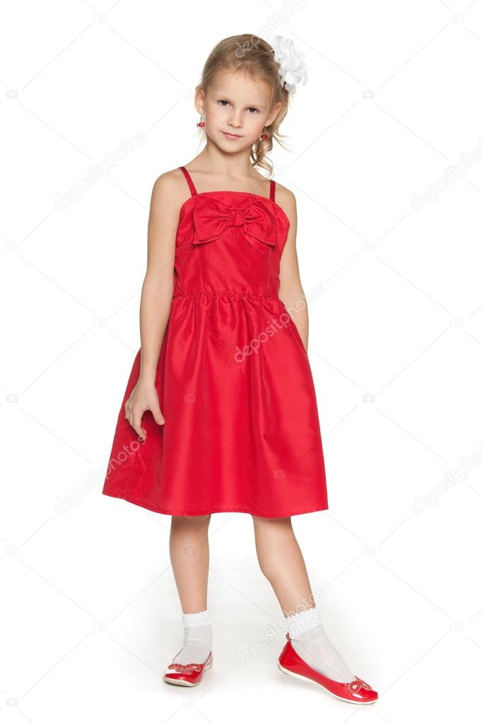 Fashion young girl in red dress — Stock Photo © SergiyN #35961039