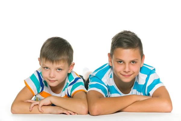 Two pensive brothers on the floor — Stock Photo, Image