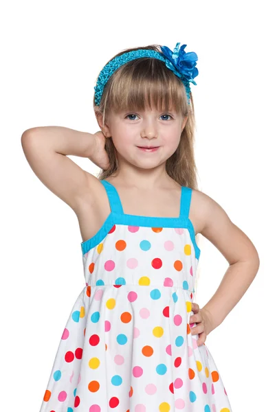 Pretty little girl in polka dot dress — Stock Photo, Image