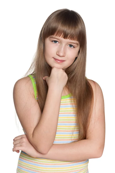 Jovem menina pensativa no fundo branco — Fotografia de Stock