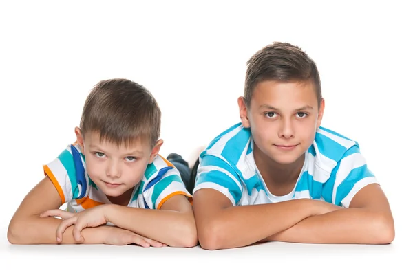 Two thoughtful brothers on the floor — Stock Photo, Image