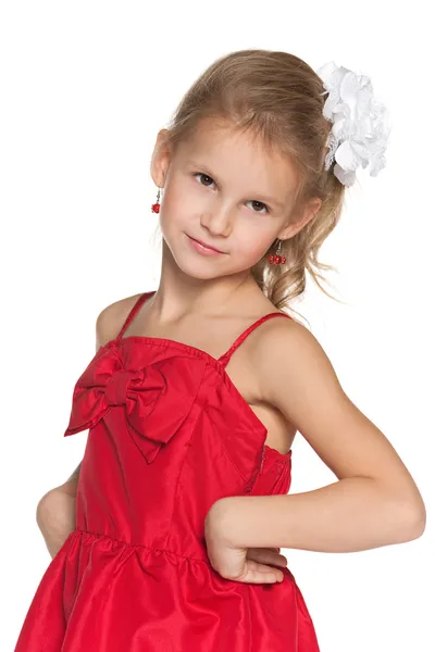 Mladá dívka v módní červené šaty — Stock fotografie