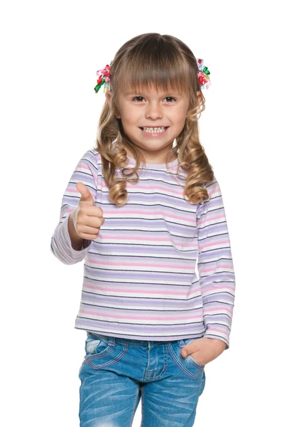 Little girl holds her thumb up — Stock Photo, Image