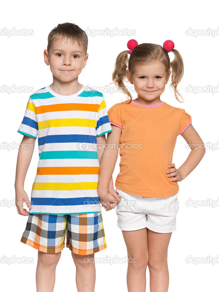 Two happy children on the white background