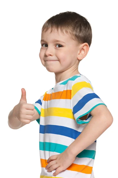 Cute boy holds his thumb up — Stock Photo, Image