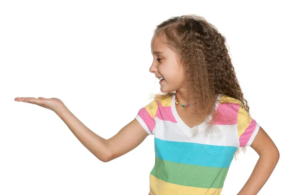 Profile of smiling girl in a striped shirt — Stock Photo, Image