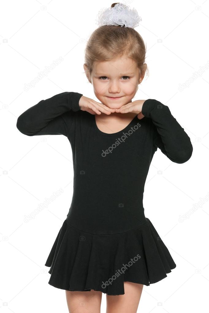 Pretty little girl prepares for dancing