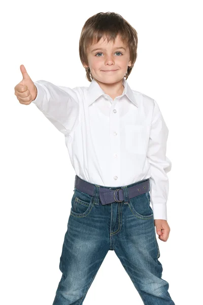 Fashion little boy holds his thumb up — Stock Photo, Image