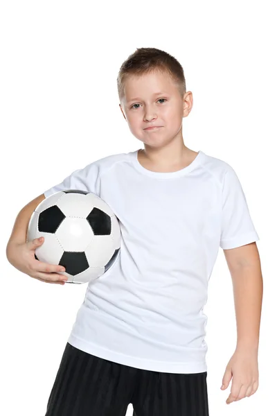 Confident boy with soccer ball — Stock Photo, Image