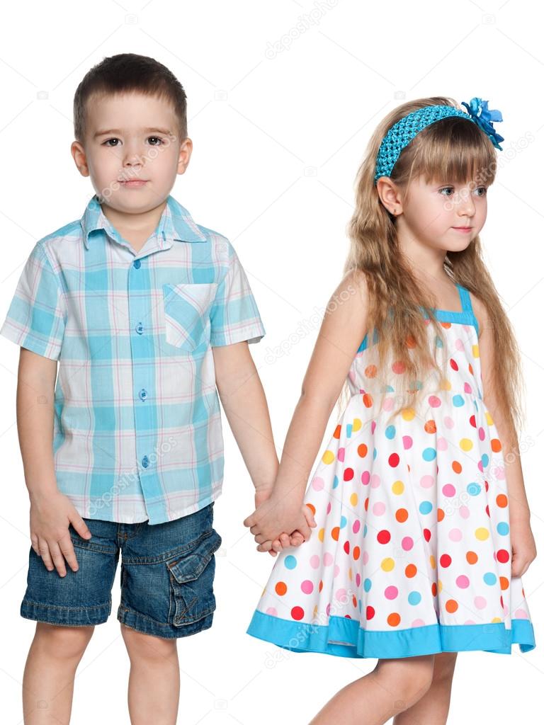 Two fashion children on the white background