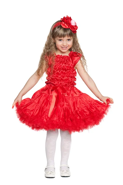 Little girl in a red dress — Stock Photo, Image