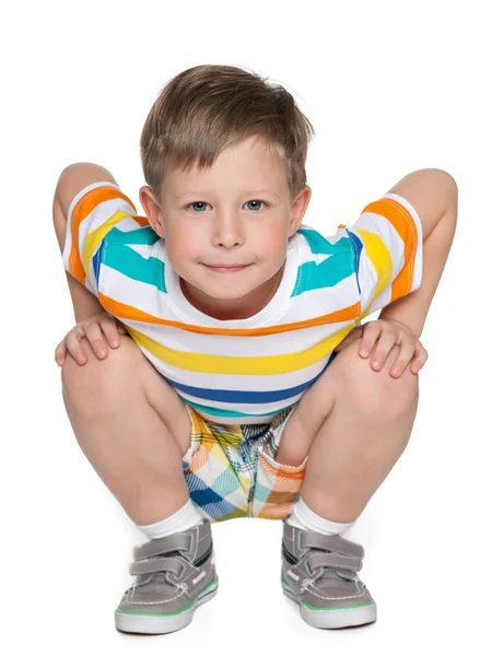 Sentado niño pequeño — Foto de Stock