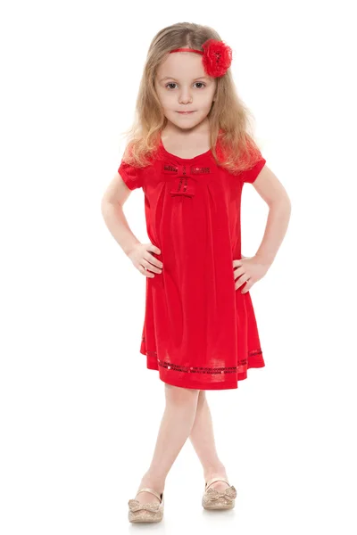 Bambina con un vestito rosso — Foto Stock