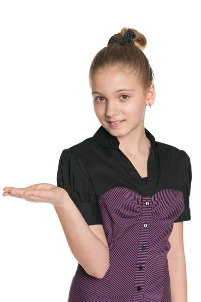 Smiling preteen girl makes hand gesture — Stock Photo, Image
