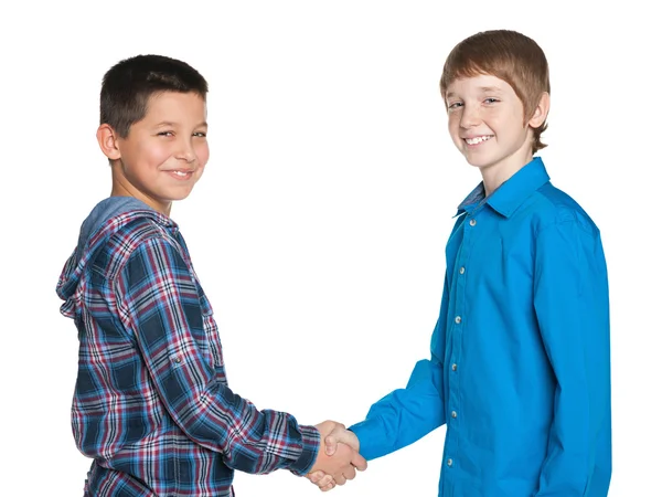 Handshake av två glada pojkar — Stockfoto