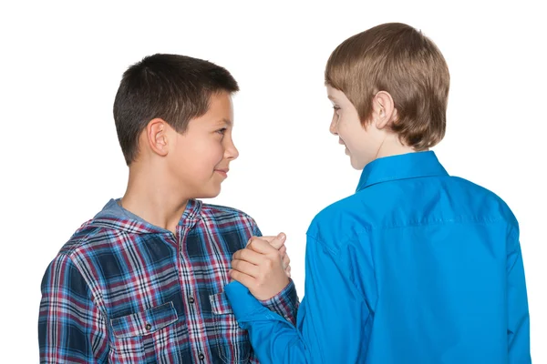 Aperto de mão de dois meninos — Fotografia de Stock