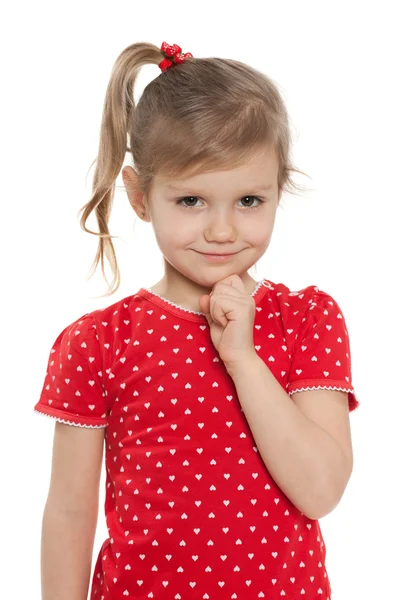 Söt liten flicka i en röd blus — Stockfoto