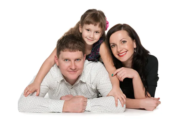 Beyaz karşı mutlu bir aile portresi — Stok fotoğraf