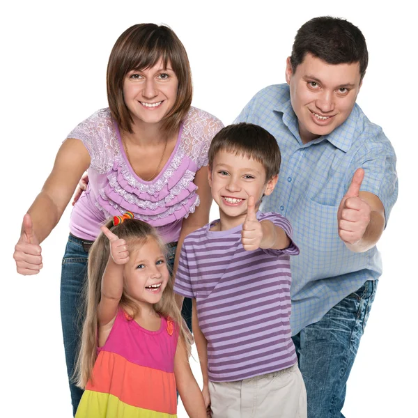 Familia sosteniendo sus pulgares hacia arriba —  Fotos de Stock
