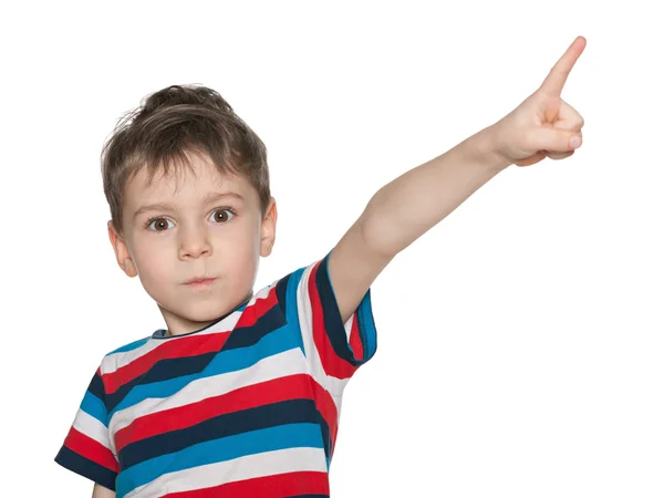 Sorprendido niño muestra su dedo a un lado —  Fotos de Stock