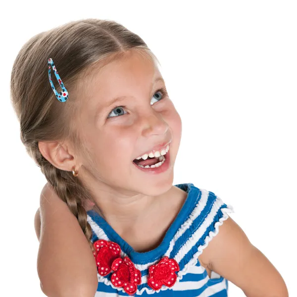 Laughing little girl looks aside — Stock Photo, Image