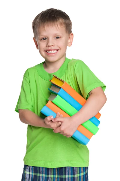 Lachen jongetje met boeken — Stockfoto