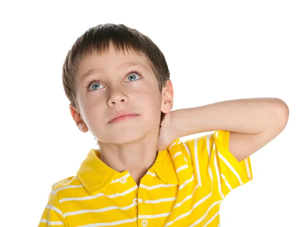 Thoughtful little boy looks up — Stock Photo, Image