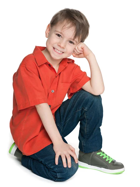 Laughing little boy in the red shirt — Stock Photo, Image