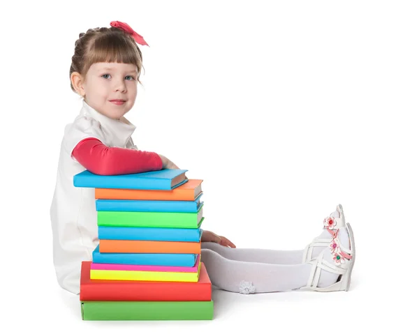 Preschool girl with books — Stock Photo, Image