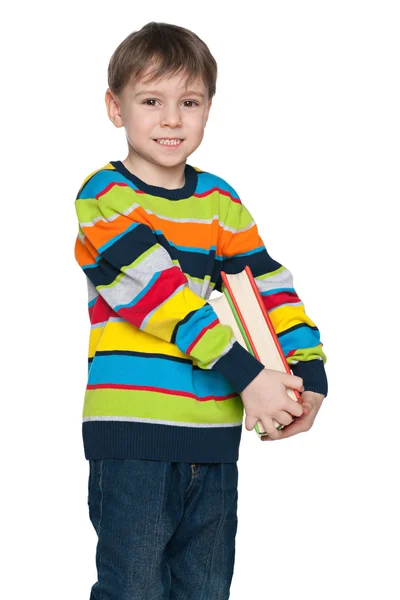 Cute little boy with book — Stock Photo, Image