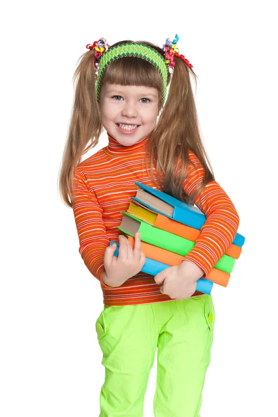 Kitaplar ile neşeli küçük kız — Stok fotoğraf