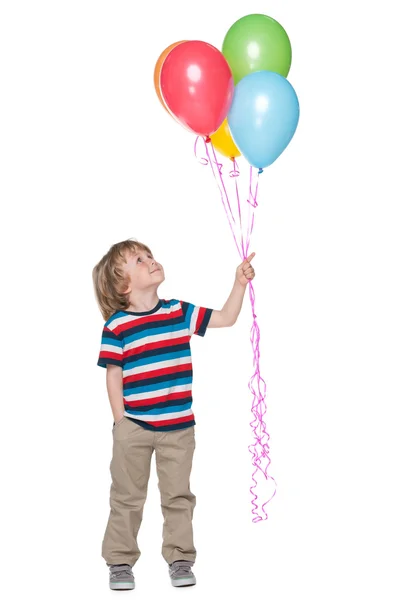 Petit garçon souriant avec ballons — Photo