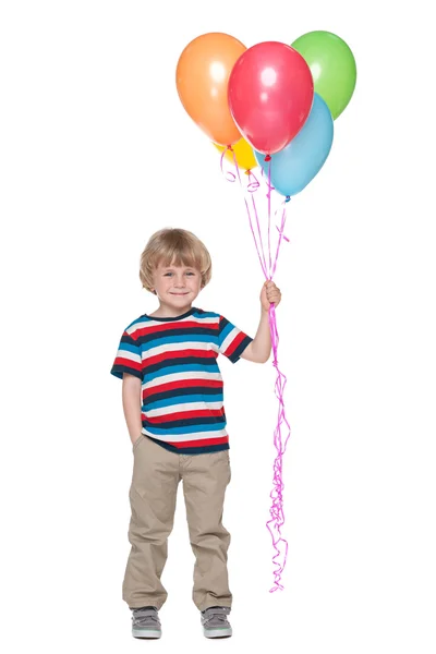 Glad liten pojke med ballonger — Stockfoto