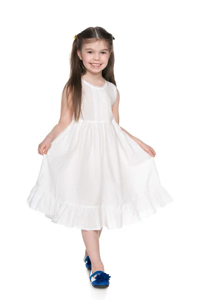Petite fille dans la robe blanche — Photo