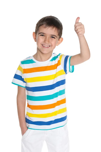 Laughing young boy holds his thumb up — Stock Photo, Image