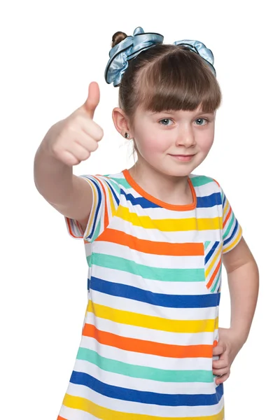 Adorável menina segura seus polegares para cima — Fotografia de Stock