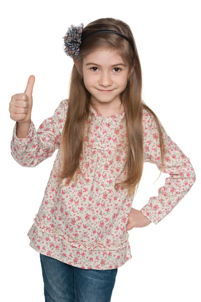 Cheerful fashion young girl holds her thumbs up — Stock Photo, Image