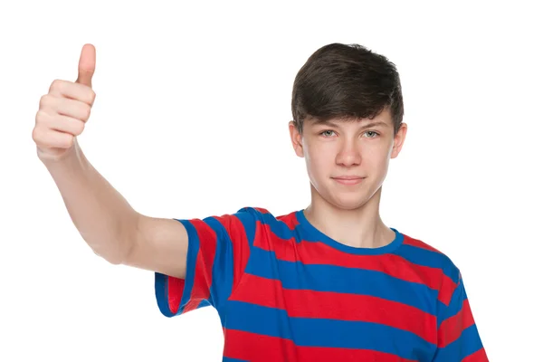 Adolescente menino mostra seu polegar para cima — Fotografia de Stock