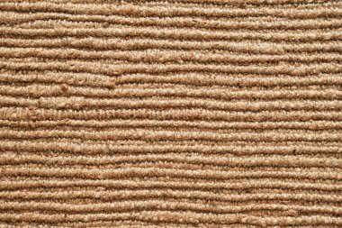 Texture of the woven jute carpet. Natural organic fiber