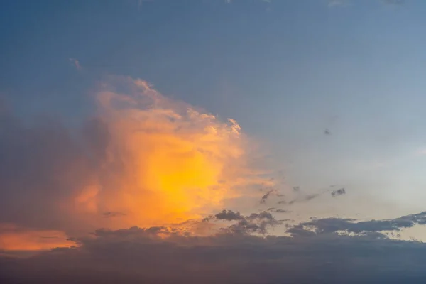 Beautiful orange cloud in the sunset sky background ストック画像