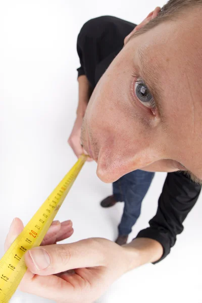 Teyp ölçme ile marangoz — Stok fotoğraf