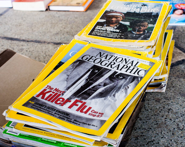 DELHI- MARCH 25, 2012: Collection of National Geographic Magazines on Mar. 25, 2012 in Daryaganj, Old Delhi Sunday market