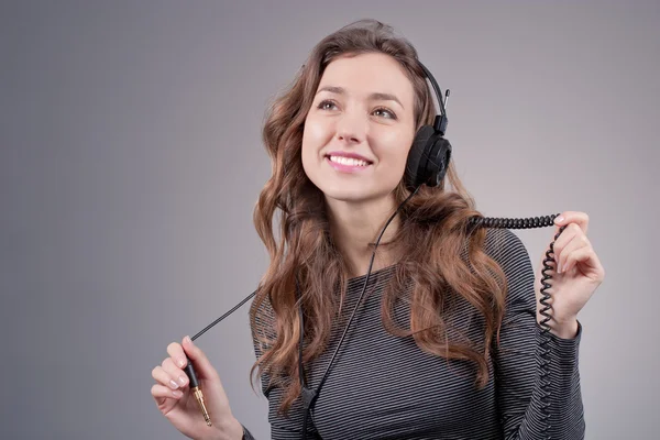 Girl in headphones — Stock Photo, Image