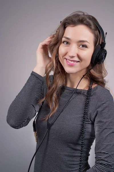 Girl in headphones — Stock Photo, Image