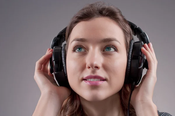 Girl in headphones — Stock Photo, Image