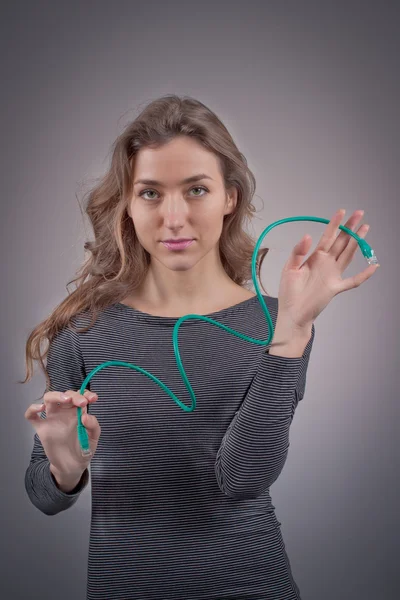 Girl with a wire — Stock Photo, Image