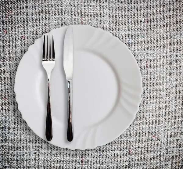 Plate with silverware — Stock Photo, Image